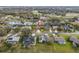 An aerial neighborhood view highlighting the property, its manicured landscape, and its advantageous location at 6352 Huntington Dr, Zephyrhills, FL 33542