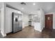 Modern kitchen with stainless steel appliances, white cabinets, and granite countertops at 6481 64Th N Ave, Pinellas Park, FL 33781