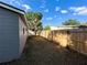 This backyard has a wooden fence and plenty of space for activities at 6982 79Th N Ave, Pinellas Park, FL 33781