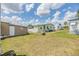 Spacious backyard with shed and green grass at 7045 El Dewitt St, Zephyrhills, FL 33541