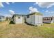 Exterior view of the side and back of the home at 7045 El Dewitt St, Zephyrhills, FL 33541