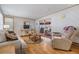 Open-concept living room featuring a cozy seating area at 7045 El Dewitt St, Zephyrhills, FL 33541