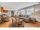 Inviting living room showcases the kitchen and comfortable furnishings at 7045 El Dewitt St, Zephyrhills, FL 33541