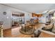 Spacious living room offering seamless transition to the kitchen at 7045 El Dewitt St, Zephyrhills, FL 33541