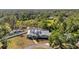 Beautiful house and property with circle drive, dormers, and well-maintained landscaping adding to the charm at 806 Linwood Ter, Lutz, FL 33549