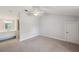 Open bedroom boasts a vanity and ensuite bathroom at 806 Linwood Ter, Lutz, FL 33549