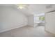 Bright, neutral bedroom with built-in desk space and ceiling fan at 806 Linwood Ter, Lutz, FL 33549