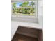 Bright desk space with built-in outlets located under a sunny window at 806 Linwood Ter, Lutz, FL 33549