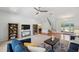 Spacious living room with a ceiling fan, and lots of natural light at 806 Linwood Ter, Lutz, FL 33549