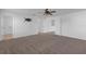 Spacious secondary bedroom featuring new carpet and neutral walls at 9107 Gablewood Pl, Land O Lakes, FL 34638