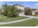 This well-maintained home includes mature landscaping, an attached two-car garage and a large driveway at 9107 Gablewood Pl, Land O Lakes, FL 34638
