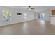 Living room featuring tile flooring and natural light, perfect for relaxation and entertainment at 9107 Gablewood Pl, Land O Lakes, FL 34638