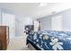 Spacious primary bedroom with light blue walls and a ceiling fan at 9205 English Oaks Ln, Riverview, FL 33578