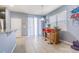 Bright dining area with stylish bar seating, perfect for casual meals and entertaining at 9205 English Oaks Ln, Riverview, FL 33578