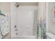 Full bathroom with shower and tub combination and decorative shower curtain at 11426 Sage Canyon Dr, Riverview, FL 33578
