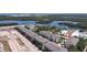 Scenic aerial shot of waterfront condos, highlighting proximity to the bay and tranquil surroundings at 1105 Venetian Harbor Ne Dr, St Petersburg, FL 33702