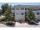 Beautiful three-story townhome featuring an attached two-car garage and well-manicured landscaping at 1105 Venetian Harbor Ne Dr, St Petersburg, FL 33702