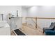 Loft area with desk, treadmill, and sitting area creates a versatile workspace at 1105 Venetian Harbor Ne Dr, St Petersburg, FL 33702