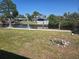 Picturesque backyard with water access, showcasing lush greenery and a serene waterside setting at 125 18Th Nw St, Ruskin, FL 33570