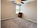 Bedroom featuring neutral carpet, a ceiling fan and natural light at 12717 Lemon Pepper Dr, Riverview, FL 33578