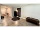 Spacious living room with tile floors at 12717 Lemon Pepper Dr, Riverview, FL 33578
