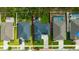 Aerial view of the property showcasing the house, backyard, and surrounding neighborhood at 12965 Satin Lily Dr, Riverview, FL 33579