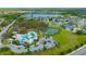 Primary-planned community has a pool, tennis courts, and a large pond, offering a variety of recreational activities at 12965 Satin Lily Dr, Riverview, FL 33579