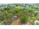 Overhead view of the community park, showcasing a playground and mature trees at 12965 Satin Lily Dr, Riverview, FL 33579