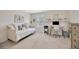 Bright bedroom with a daybed, desk area, and natural light, ideal for a room or home office at 12965 Satin Lily Dr, Riverview, FL 33579