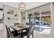 Dining room with a view of the patio area with gazebo and seating at 12965 Satin Lily Dr, Riverview, FL 33579