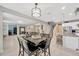 Open-concept dining area next to the kitchen and living room at 12965 Satin Lily Dr, Riverview, FL 33579