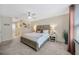 Comfortable main bedroom with decorative wall and neutral tones at 12965 Satin Lily Dr, Riverview, FL 33579
