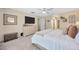 Bright and spacious main bedroom with dresser and plenty of room and natural light at 12965 Satin Lily Dr, Riverview, FL 33579