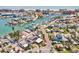A panoramic aerial view demonstrates the home's desirable coastal location and peaceful community atmosphere at 13098 Boca Ciega Ave, Madeira Beach, FL 33708