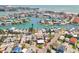 A serene aerial shot highlights the home's closeness to waterfront activities and the scenic coastal environment at 13098 Boca Ciega Ave, Madeira Beach, FL 33708