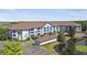 Beautiful exterior view of a multi-Gathering residence, showcasing architectural details and surrounding landscape at 1610 Raena Dr # 204, Odessa, FL 33556