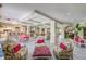 Open-concept community lounge featuring comfortable seating arrangements and a functional kitchenette at 1610 Raena Dr # 204, Odessa, FL 33556