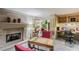 Cozy lounge area with fireplace, computers, and comfortable seating at 1610 Raena Dr # 204, Odessa, FL 33556
