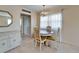 Charming dining room with chandelier and classic furnishings at 201 Kings Blvd # 19, Sun City Center, FL 33573