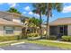 Well-maintained exterior of a condo with landscaping and clearly marked parking at 2131 Ridge S Rd # 130, Largo, FL 33778