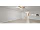 Spacious living room with a ceiling fan, neutral walls, and tile flooring at 2131 Ridge S Rd # 130, Largo, FL 33778