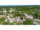 An aerial view of a neighborhood showcases a home with mature trees and proximity to urban amenities at 2920 N 11Th St, Tampa, FL 33605