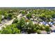 Lush treetops surround this home in an idyllic, tree-filled neighborhood as seen in the aerial shot with pin drop at 2920 N 11Th St, Tampa, FL 33605