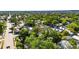 An aerial view of a neighborhood with tree-lined streets showcasing the location of a charming home at 2920 N 11Th St, Tampa, FL 33605