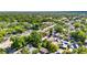 Lush treetops surround the home in an idyllic, tree-filled neighborhood as seen in the aerial shot at 2920 N 11Th St, Tampa, FL 33605