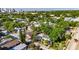 Aerial view of a charming home in a tree-lined neighborhood, near the city skyline at 2920 N 11Th St, Tampa, FL 33605