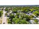 An aerial view of a neighborhood with tree-lined streets showcasing the location of a charming home at 2920 N 11Th St, Tampa, FL 33605