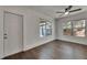 Bedroom with ceiling fan, natural light, and wood floors for comfort and style at 2920 N 11Th St, Tampa, FL 33605