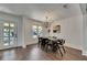 Bright dining room with modern lighting, stylish table setting, and doorway to the front yard at 2920 N 11Th St, Tampa, FL 33605