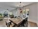 Modern dining area features natural light and an open layout to the living room at 2920 N 11Th St, Tampa, FL 33605